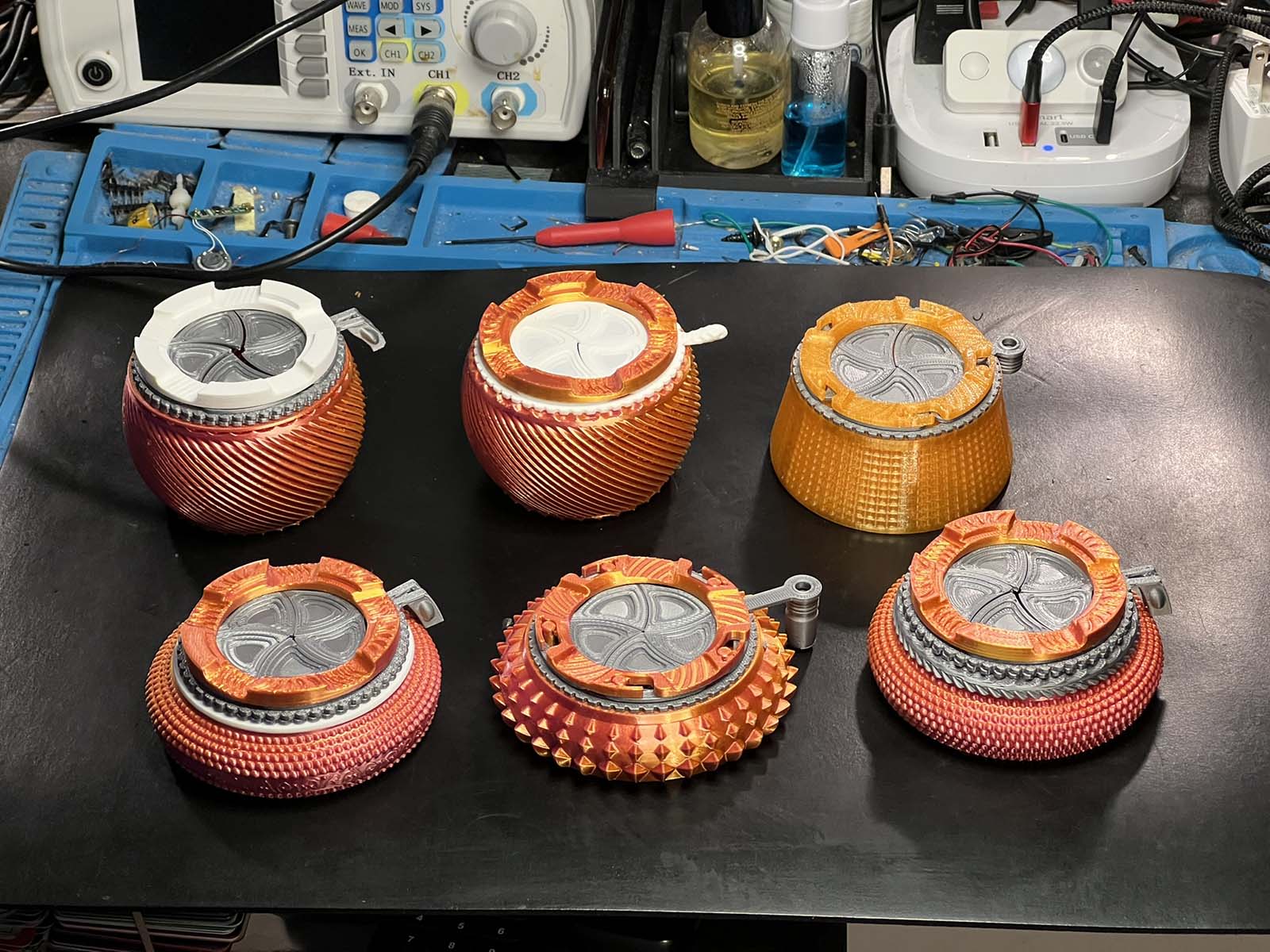 Variations of a 3d printed container from custom NVision4D 3d models.